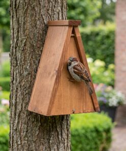 Huismus bij nestkast Mus Triangel